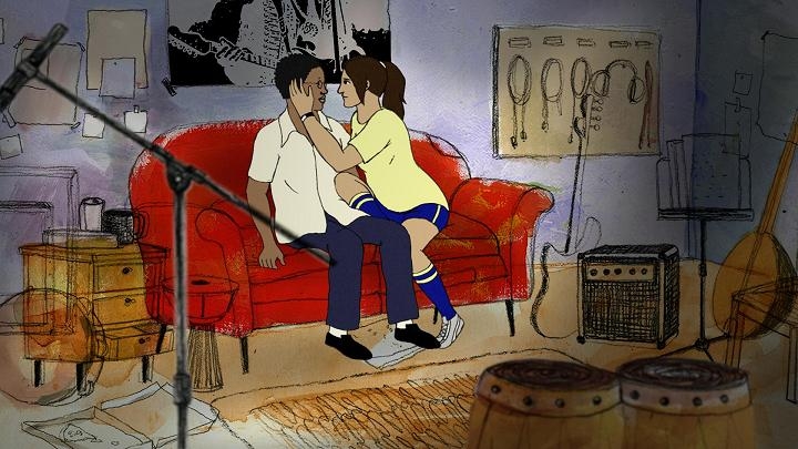 Två sitter på en soffa, ur filmen Sex på kartan